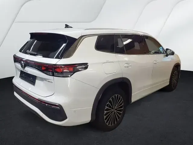 Gebraucht VW Tayron Elegance 204 PS (150 kW) 2025 Oryxweiß perlmutteffekt SUV