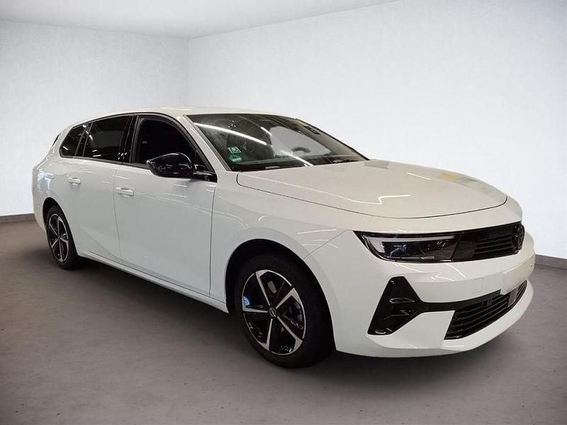 Gebraucht Opel Astra 131 PS (96 kW) 2025 Lack weiss banquise/typ aussenverkleidun Kombi