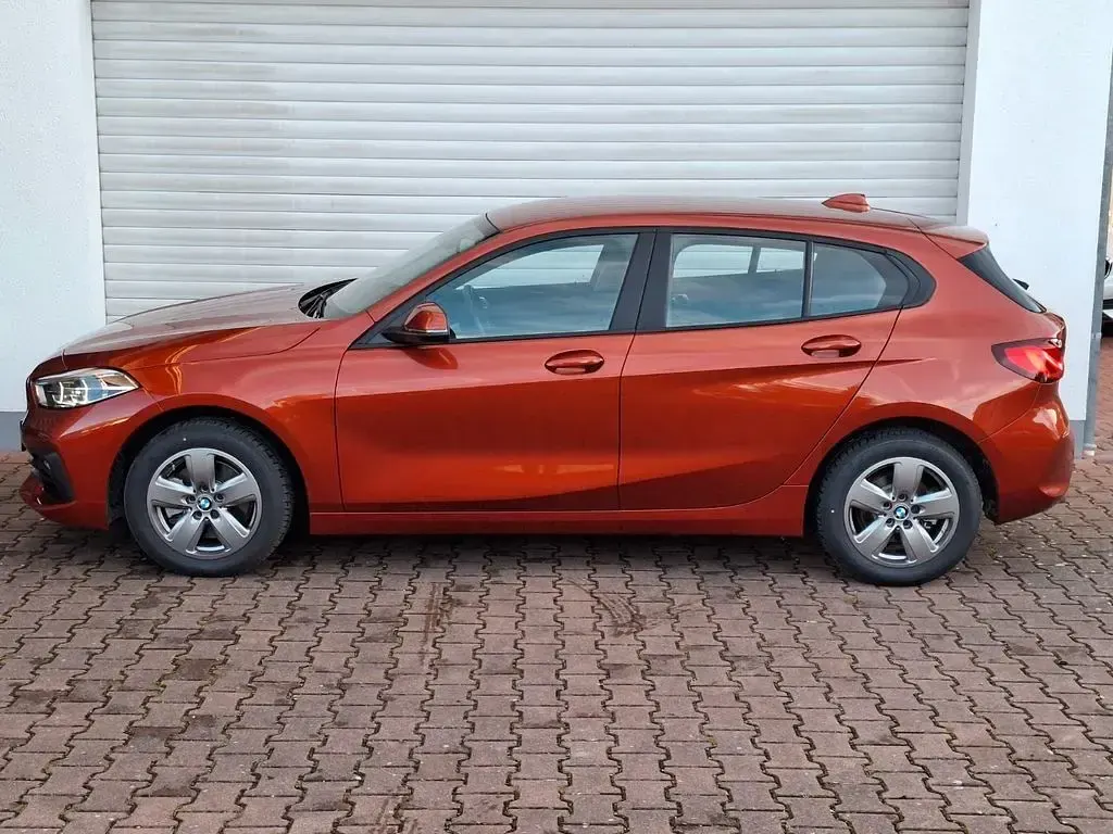Gebraucht BMW 116 Advantage 109 PS (80 kW) 2024 Sunset orange metallic Kleinwagen