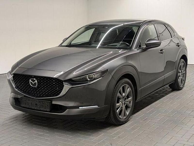 Grau (machine gray) Gebraucht 2021 Mazda CX-30 Selection SUV | 23.980 € (Etwas zu teuer) - Bild 1/4