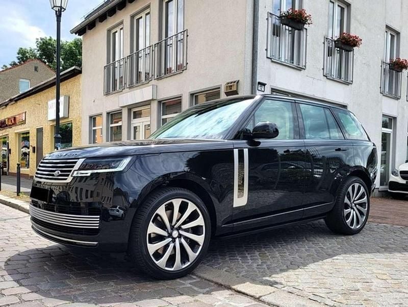 Santorini black Gebraucht 2024 Land Rover Range Rover SUV | 232.880 € - Bild 1/4