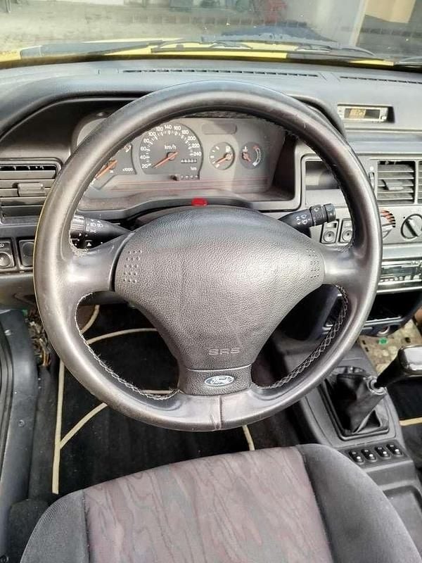 Gebraucht Ford Escort Cabriolet 105 PS (77 kW) 1994 Gelb Cabrio