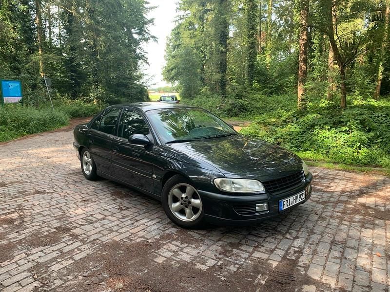Schwarz Gebraucht 1996 Opel Omega Limousine | 1.999 € (Fairer Preis) - Bild 1/4