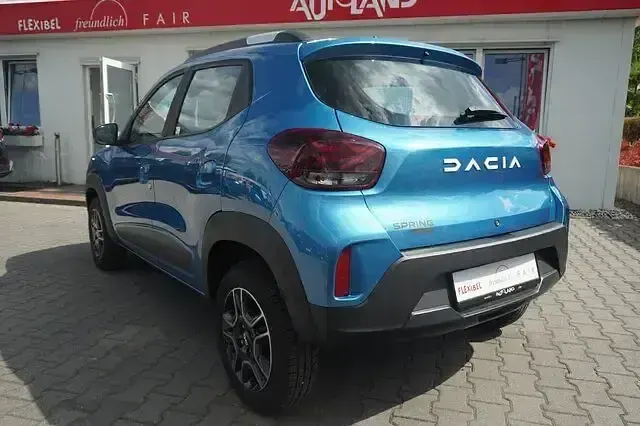 Gebraucht Dacia Spring Essentiel 33 kW (45 PS) 2023 Morgenbrisenblau Kleinwagen