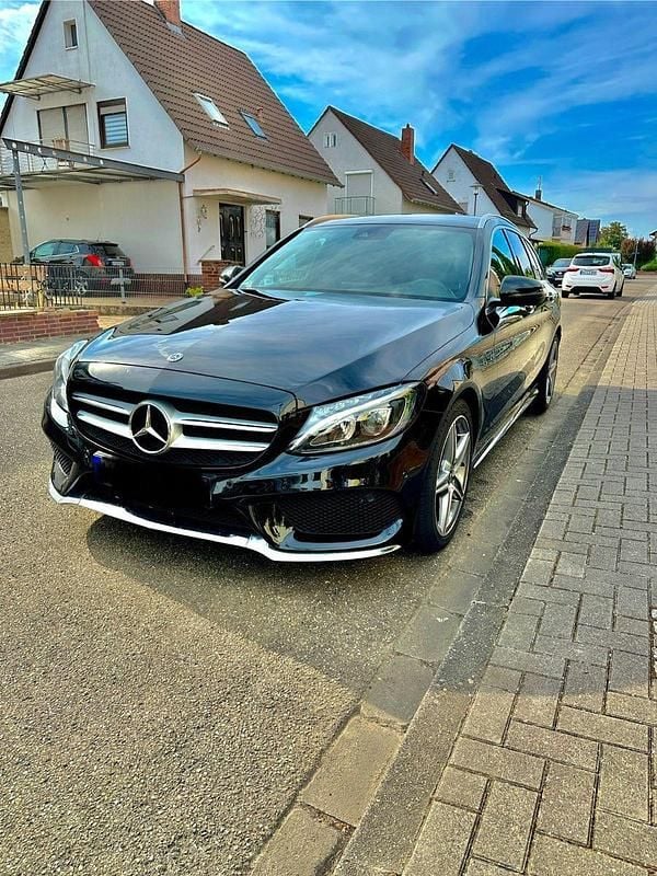 Schwarz Gebraucht 2017 Mercedes C250 AMG line Kombi | 16.800 € (Guter Preis) - Bild 1/4