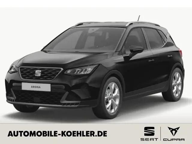Midnight schwarz metallic Gebraucht 2024 Seat Arona FR SUV | 25.890 € (Teuer) - Bild 1/4