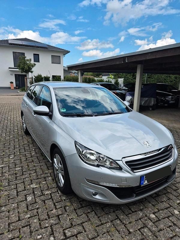Silber Gebraucht 2015 Peugeot 308 SW Kombi | 9.985 € - Bild 1/4