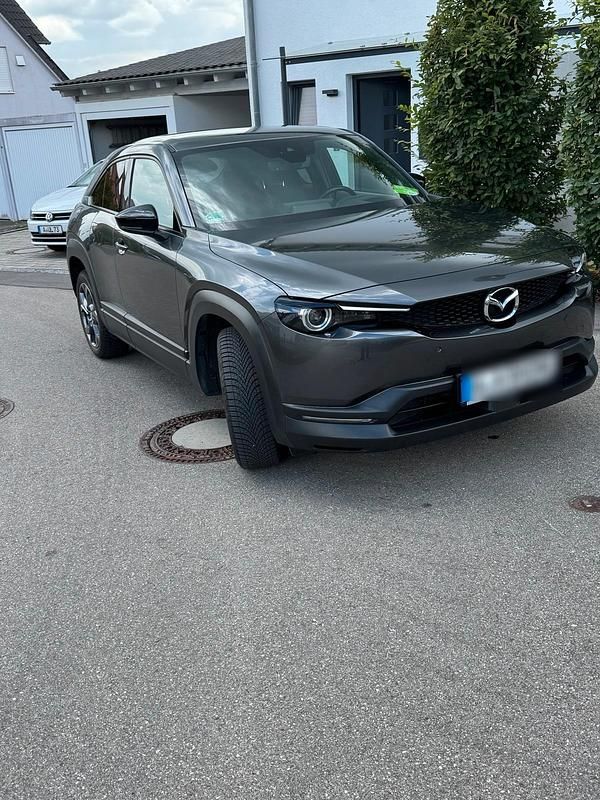 Grau Gebraucht 2021 Mazda MX30 Prime-Line SUV | 13.850 € (Guter Preis) - Bild 1/4