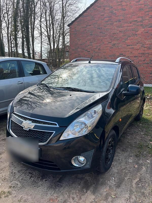 Second-hand Chevrolet Spark 82 CP (60 kW) 2011 Negru Hatchback
