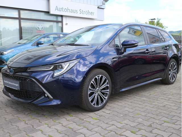 Nagoyablau metallic Gebraucht 2021 Toyota Corolla Team Kombi | 20.400 € (Superpreis) - Bild 1/4