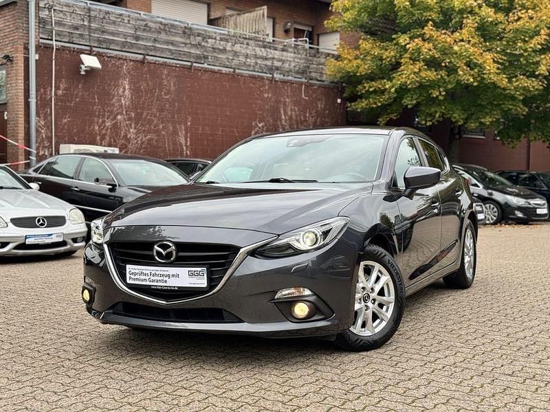 Grau Gebraucht 2015 Mazda 2 Center-Line Limousine | 12.590 € - Bild 1/4