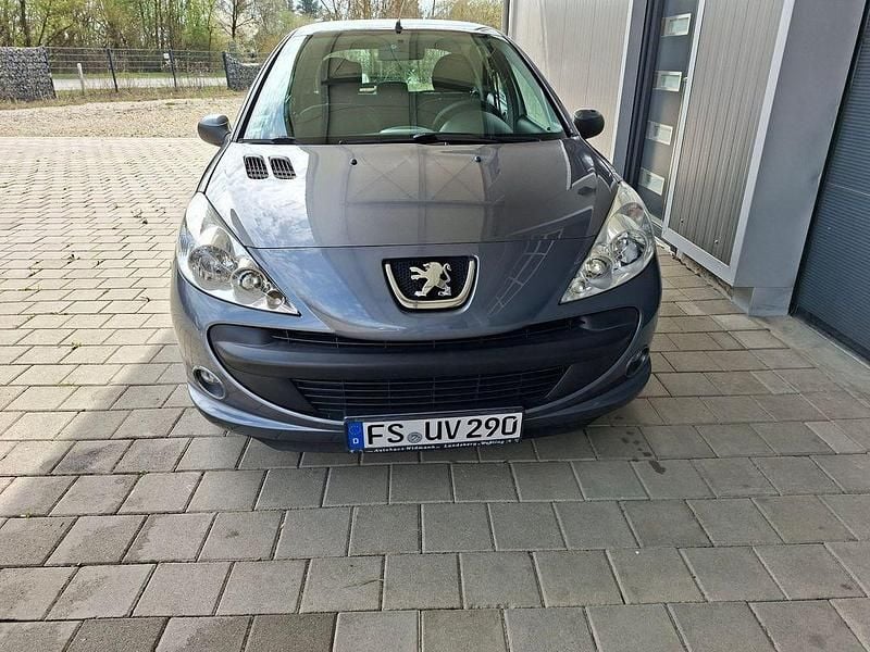 Gebraucht Peugeot 206+ 73 PS (53 kW) 2011 Grau Kleinwagen