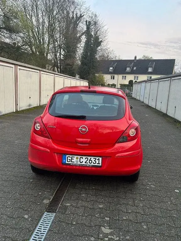 Gebraucht Opel Corsa Edition 69 PS (50 kW) 2014 Rot Kleinwagen