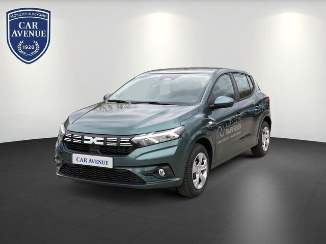 Grün (zedergrün (grün)) Gebraucht 2025 Dacia Sandero Expression Kleinwagen | 18.475 € (Fairer Preis) - Bild 1/4