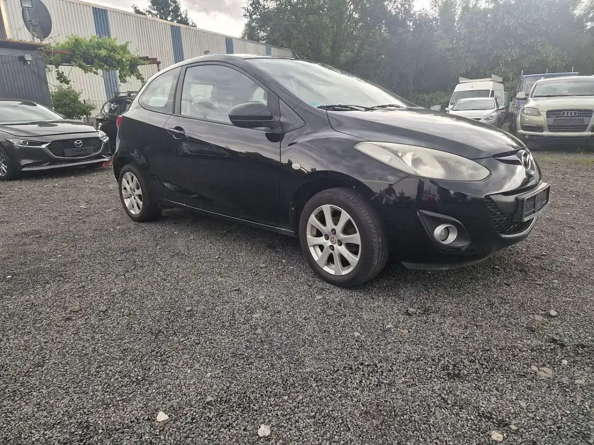 Gebraucht Mazda 2 Active 84 PS (61 kW) 2011 Brillantschwarz Kleinwagen