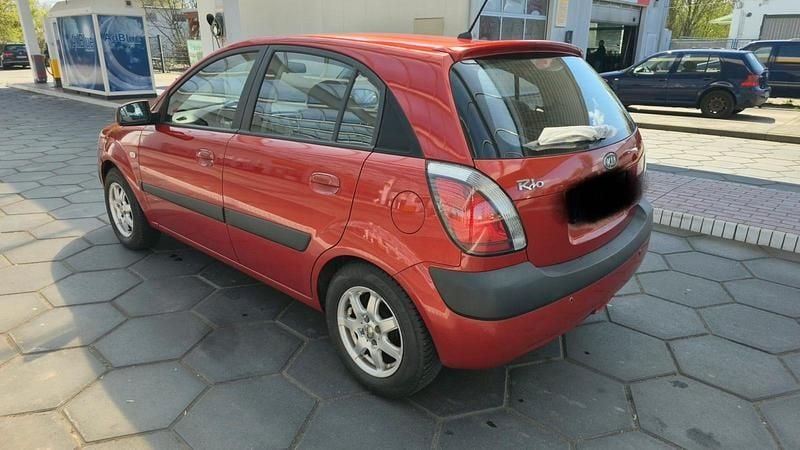 Second-hand Kia Rio 95 CP (69 kW) 2009 Roșu Berlinǎ