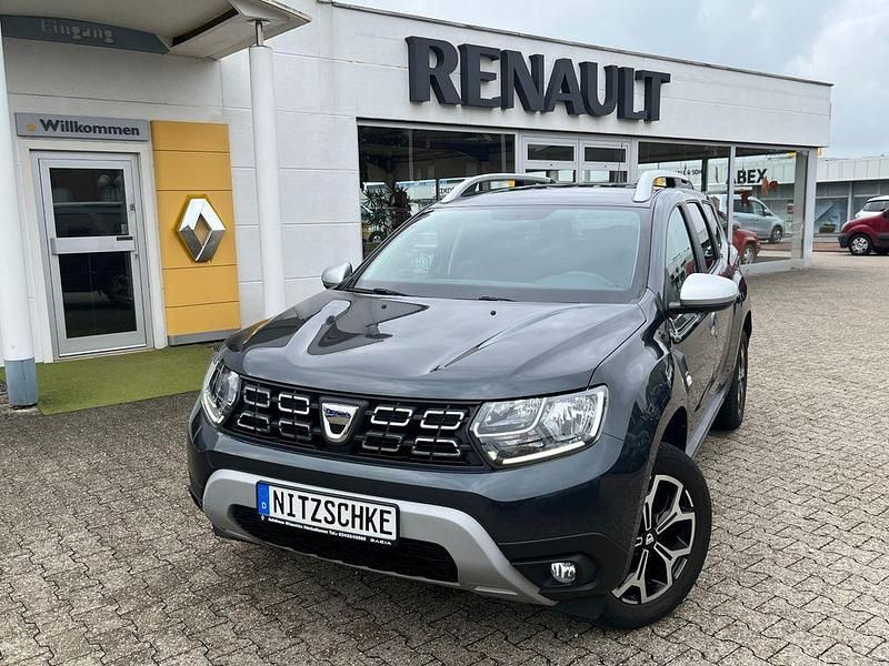 Grau Gebraucht 2021 Dacia Duster Prestige SUV | 14.990 € (Fairer Preis) - Bild 1/4