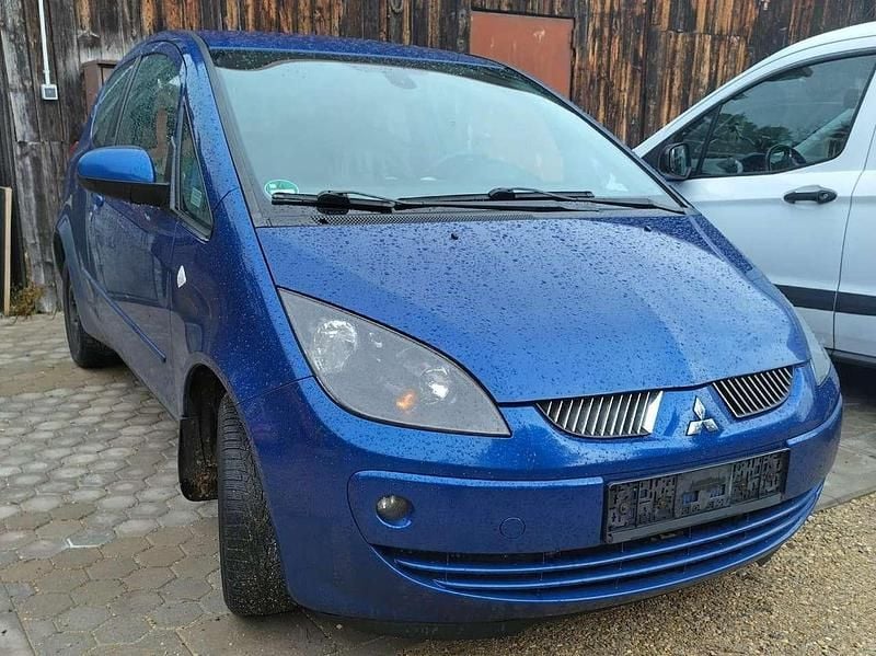 Blau Gebraucht 2006 Mitsubishi Colt Motion Limousine | 899 € - Bild 1/4