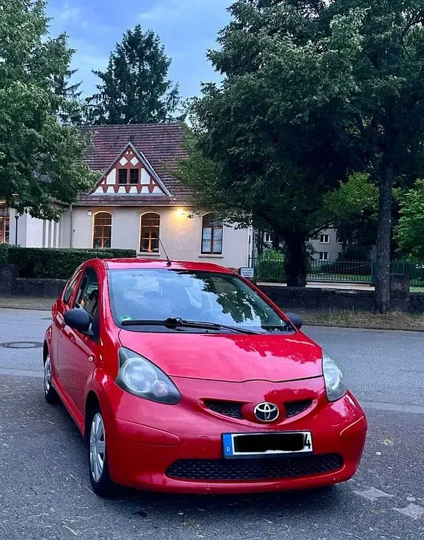 Gebraucht Toyota Aygo Basis 68 PS (50 kW) 2007 Rot Kleinwagen