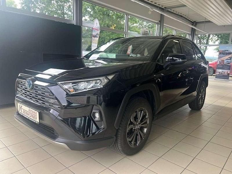 Mysticschwarz mica met. Gebraucht 2023 Toyota RAV4 Hybrid Team SUV | 35.900 € (Superpreis) - Bild 1/4