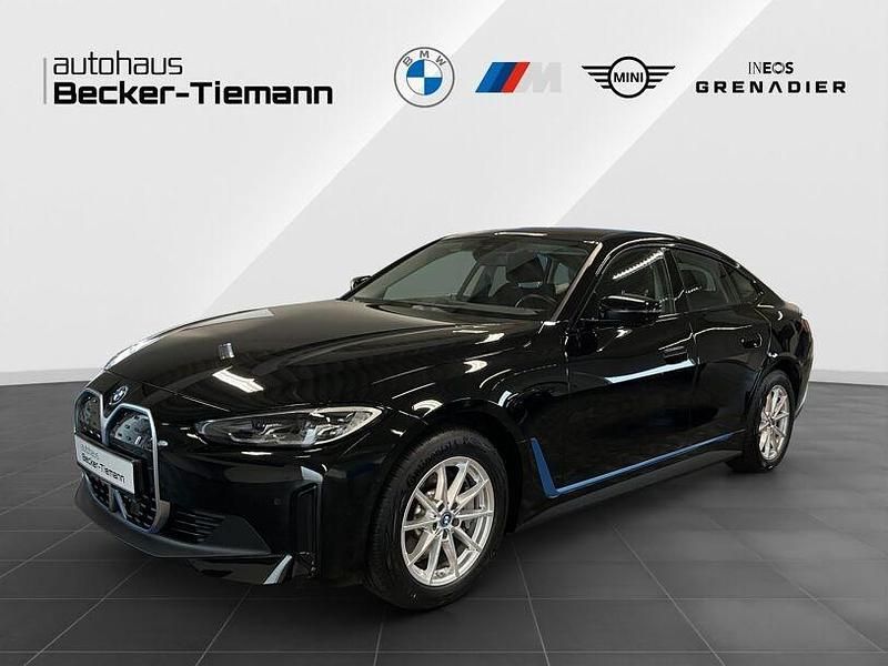 Schwarz ii Gebraucht 2023 BMW i4 Efficient Dynamics Limousine | 43.996 € (Superpreis) - Bild 1/4