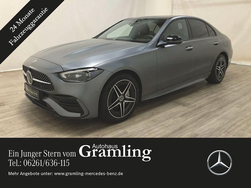 Manufaktur selenitgrau magno Gebraucht 2023 Mercedes C300e AMG Limousine | 56.499 € - Bild 1/4