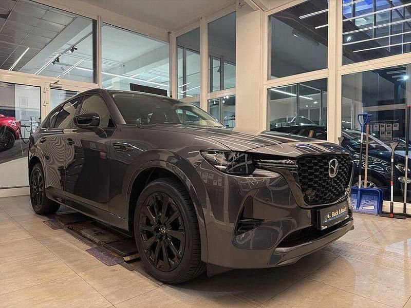 Machine grey (metallic) Gebraucht 2023 Mazda CX-60 Homura-Line SUV | 40.950 € (Fairer Preis) - Bild 1/4