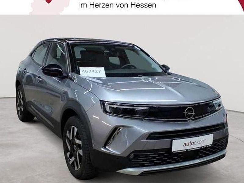 Gebraucht Opel Mokka-e Elegance 100 kW (136 PS) 2023 Quarz silber metallic SUV