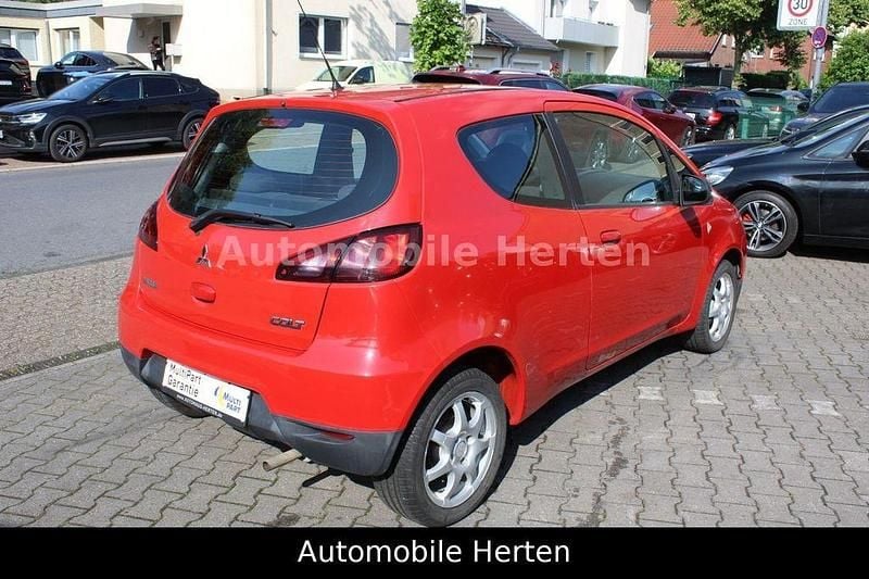 Gebraucht Mitsubishi Colt Inform 95 PS (69 kW) 2009 Rot Kleinwagen