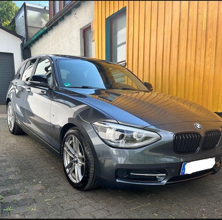 Grau Gebraucht 2013 BMW 116 Sport Line Kleinwagen | 9.000 € - Bild 1/4