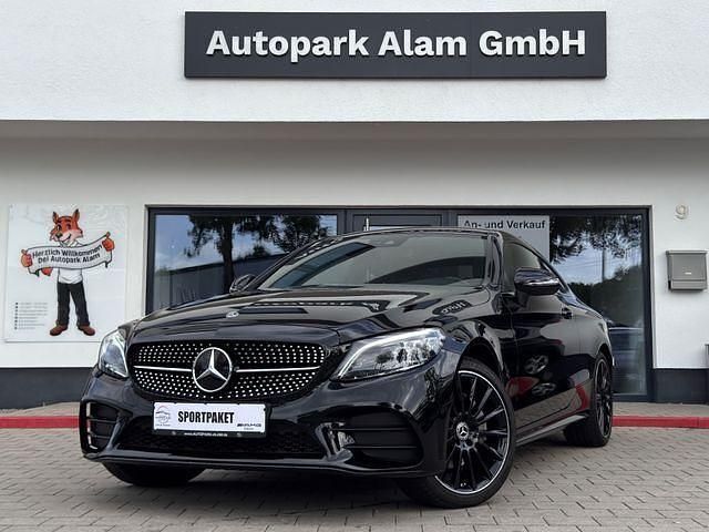 Ung. schwarz unilack Gebraucht 2021 Mercedes C200 AMG Coupé | 37.999 € (Fairer Preis) - Bild 1/4