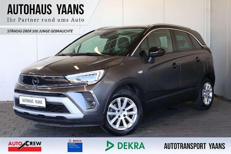 Mondstein grau/e:vulkan grau Gebraucht 2021 Opel Crossland X Elegance SUV | 10.289 € (Superpreis) - Bild 1/4