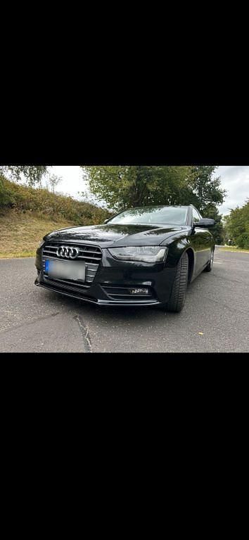 Schwarz Gebraucht 2013 Audi A4 Ambition Kombi | 11.999 € (Teuer) - Bild 1/4