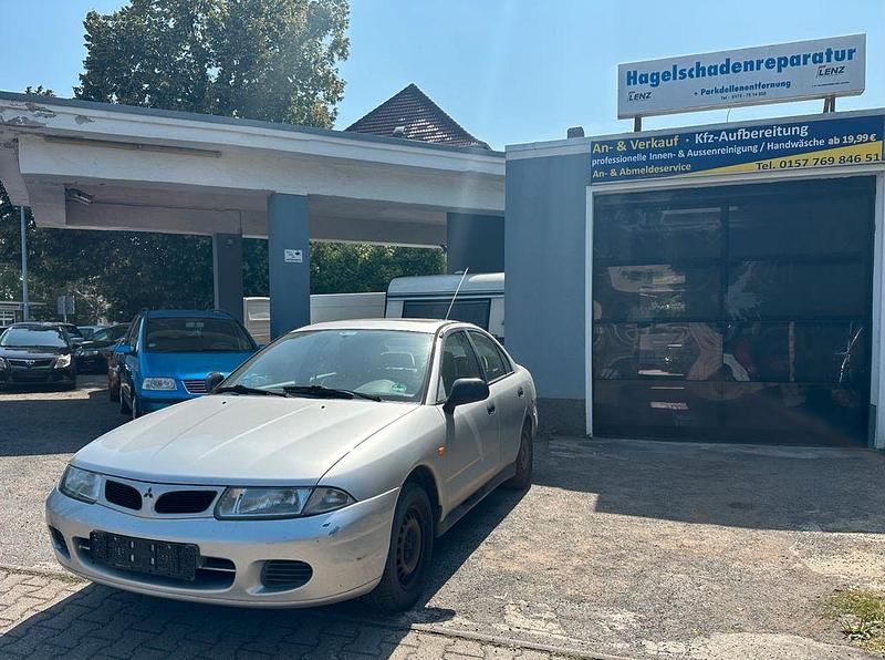 Grau Gebraucht 1996 Mitsubishi Carisma Limousine | 999 € - Bild 1/4