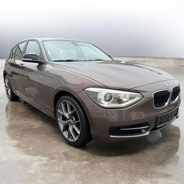 Gebraucht BMW 118 Sport Line 170 PS (125 kW) 2014 Sparkling bronze metallic Kleinwagen