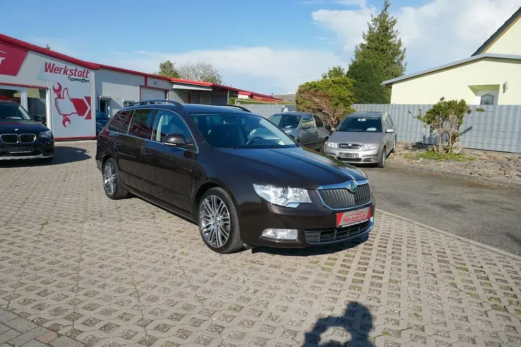 Używany Skoda Superb Ambition 140 KM (102 kW) 2012 Brązowy Kombi