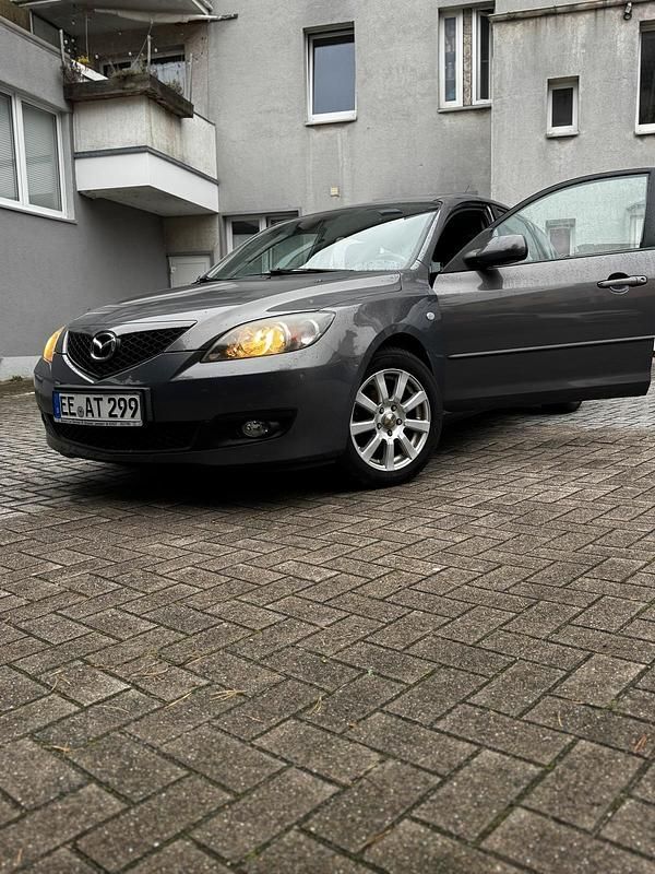 Grau Gebraucht 2007 Mazda 3 Limousine | 4.499 € - Bild 1/4