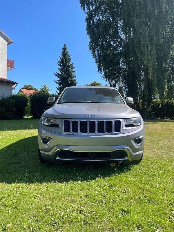Silber Gebraucht 2015 Jeep Grand Cherokee Overland SUV | 11.499 € (Guter Preis) - Bild 1/4