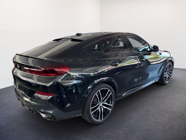 Black sapphire black sapphire Gebraucht 2024 BMW X6 M Sport SUV | 99.190 € - Bild 1/4