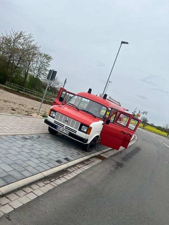 Second-hand Ford Transit 77 CP (56 kW) 1983 Roșu Monovolum