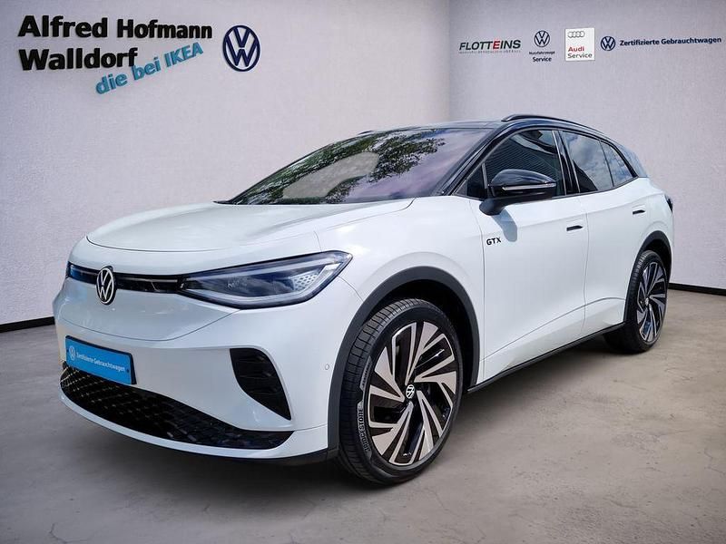 Gletscherweiß metallic Gebraucht 2024 VW ID.4 GTX SUV | 49.806 € (Teuer) - Bild 1/4
