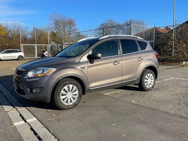 Braun Gebraucht 2012 Ford Kuga Titanium SUV | 6.900 € (Fairer Preis) - Bild 1/4