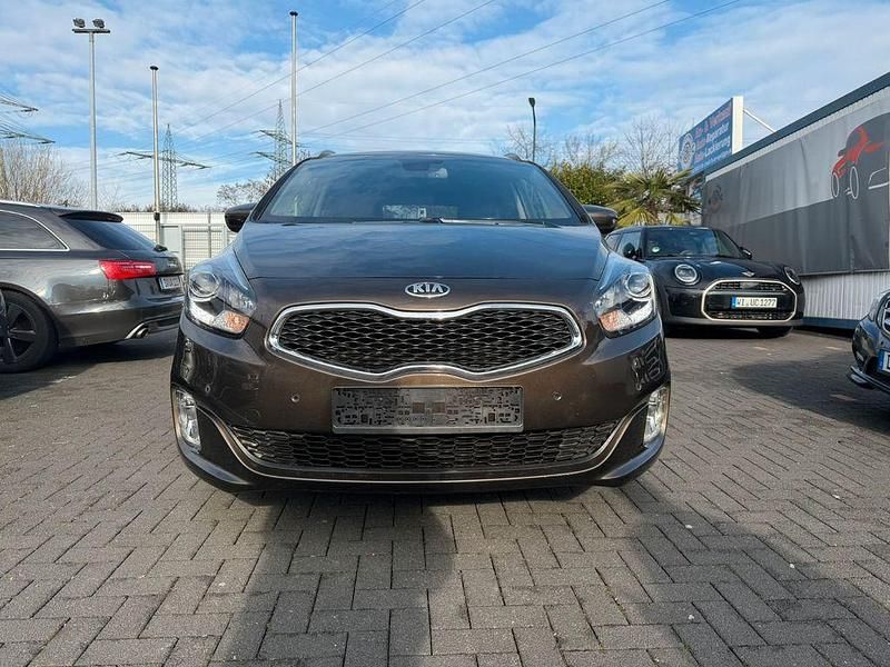 Gebraucht Kia Carens DREAM-TEAM Edition 135 PS (99 kW) 2015 Braun Van / Kleinbus