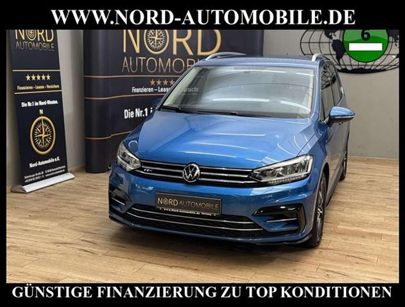 Caribbean blue metallic (metallic) Gebraucht 2021 VW Touran R-line Van / Kleinbus | 26.989 € (Guter Preis) - Bild 1/3