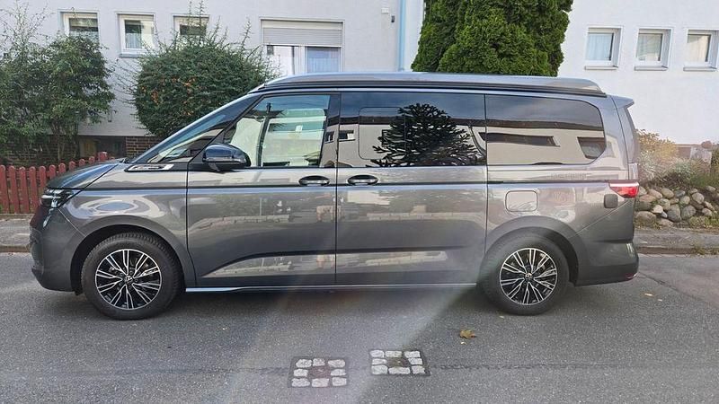 Grau Gebraucht 2024 VW T7 Beach Van | 62.900 € - Bild 1/4