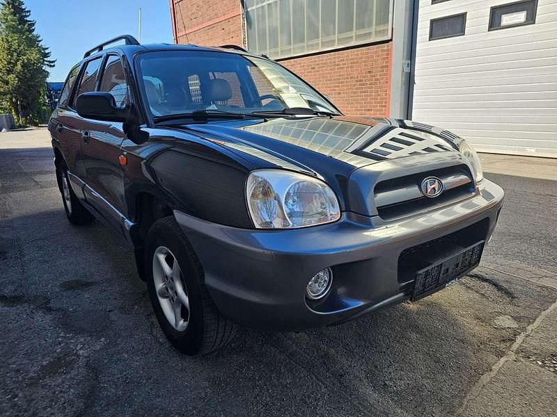 Ebony black+cool gra Gebraucht 2005 Hyundai Santa Fe GLS SUV | 3.900 € (Etwas zu teuer) - Bild 1/4