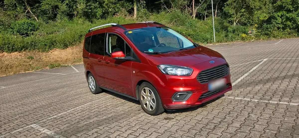 Gebraucht Ford Tourneo Courier 100 PS (73 kW) 2018 Orange Van / Kleinbus