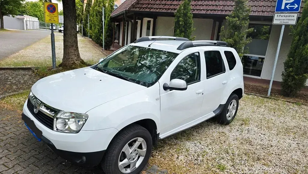 Używany Dacia Duster Prestige 105 KM (77 kW) 2012 Biały SUV