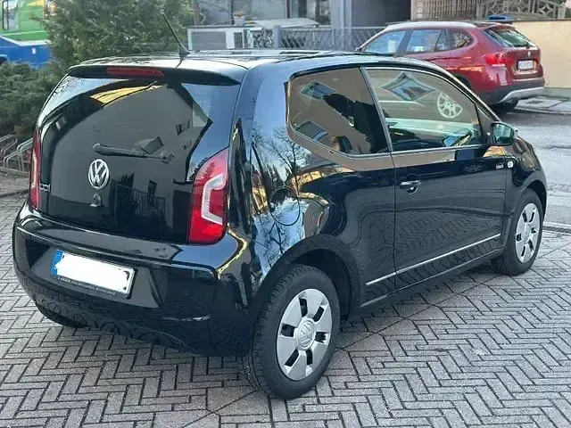 Usado VW up! 75 CV (55 kW) 2011 Negro Utilitario
