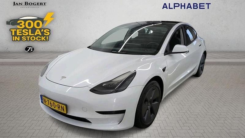 Weiß Gebraucht 2021 Tesla Model 3 Standard Range Limousine | 21.900 € (Fairer Preis) - Bild 1/4